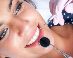 A women getting a checkup of her teeths