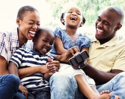 500x332_0011_Happy smiling family on couch Happy Family