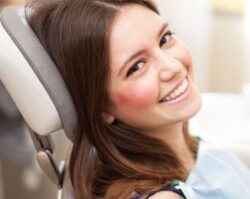 Relieving Dental Anxiety in Plano, TX at 1st in Smiles A smiling women