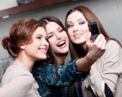 friends clicking group selfie