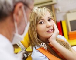 Dental Anxiety 1 | 1st in Smiles - Dentist Plano, TX women in toothache