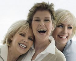 three women laughing