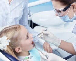 Dentist performing Oral surgery