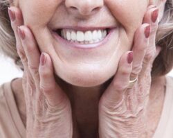 Restorative Dentistry 1 | 1st in Smiles - Dentist Plano, TX A women smiling